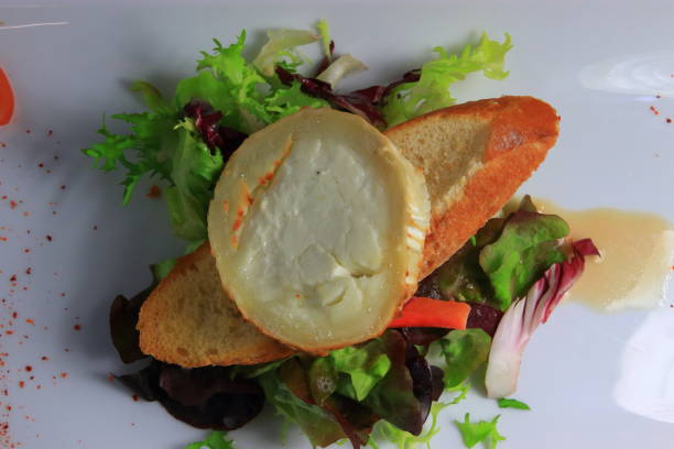 hot goat cheese salad on bread slice