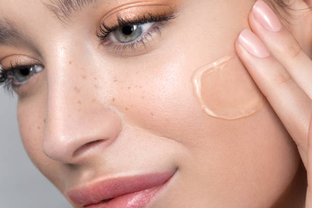 istock Young woman with perfect skin applying foundation 1133083353