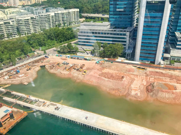 Land Reclamation In Singapore Land reclamation in Singapore near Sentosa Island. view into land stock pictures, royalty-free photos & images