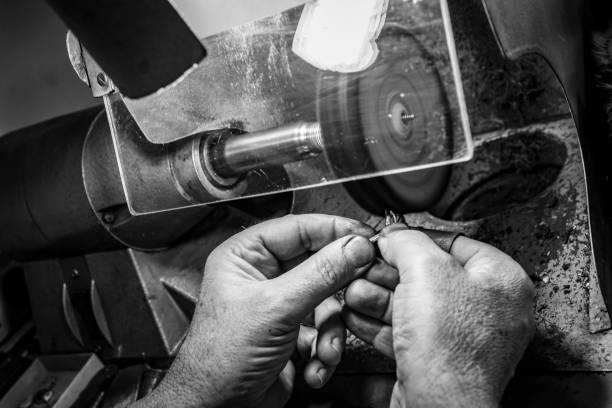 istock hands of jewelry technician 1133094185