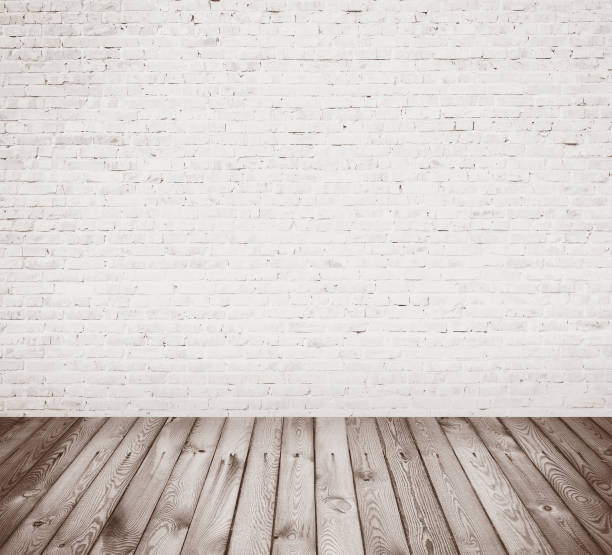 istock interior room with brick wall and wooden floor 1133096550