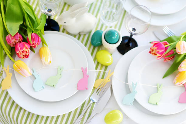 istock Beautiful table setting with crockery and flowers for Easter celebration 1133106048