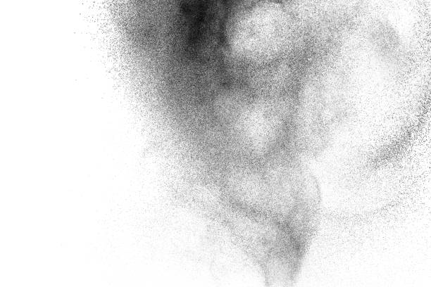 istock Black powder explosion against white background. Charcoal dust particles exhale in the air. 1133106121