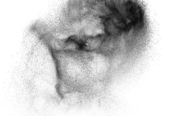 istock Black powder explosion against white background. Charcoal dust particles exhale in the air. 1133106122