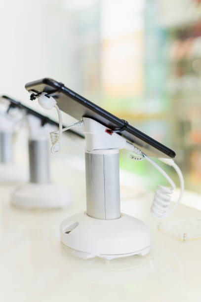 istock mobile phone in shop, electronics internet and communication network service business, Digital gadget and smartphone in electronic store. 1133107997