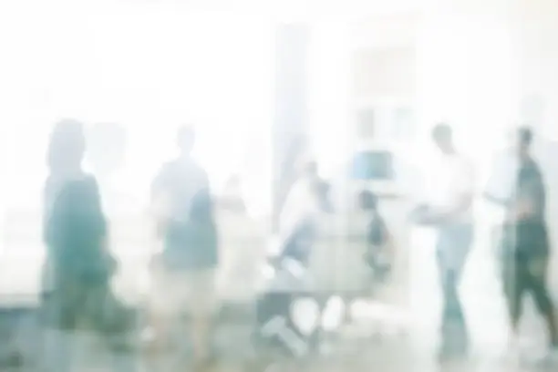 Photo of Blurred business people meeting in office interior with space for business brainstorming background design