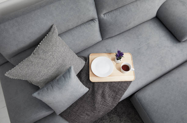 istock Scandinavian style livingroom with fabric sofa, sofa table. morning image with plant. sofa table on the lug. 1133113551
