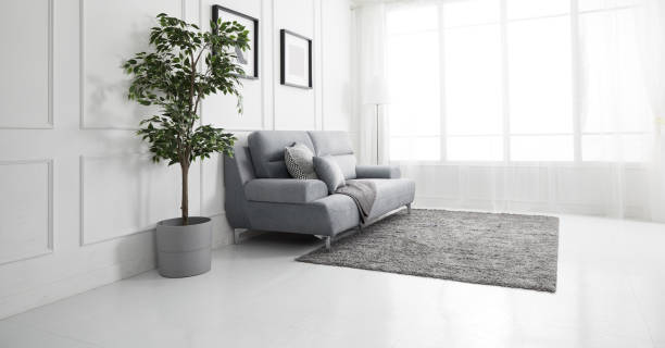 istock Scandinavian style livingroom with fabric sofa, sofa table. morning image with plant. sofa table on the lug. 1133113552