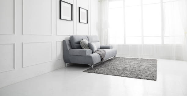 istock Scandinavian style livingroom with fabric sofa, sofa table. morning image with plant. sofa table on the lug. 1133113553
