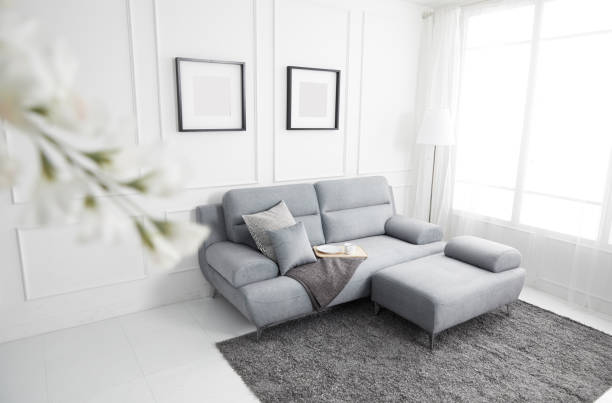 istock Scandinavian style livingroom with fabric sofa, sofa table. morning image with plant. sofa table on the lug. 1133113580