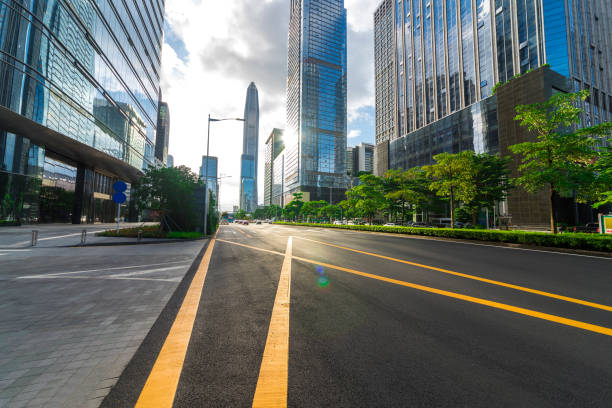 istock highway transportation and the high-rise building under the blue sky. 1133118013