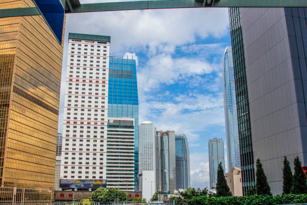 istock Window glass, Modern architecture in the blue sky white cloud city 1133120025