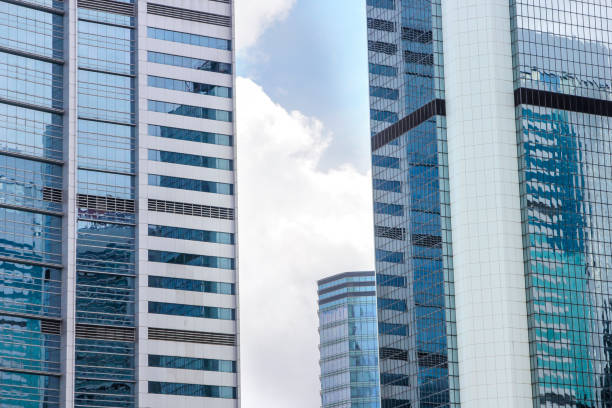 istock Window glass, Modern architecture in the blue sky white cloud city 1133120054