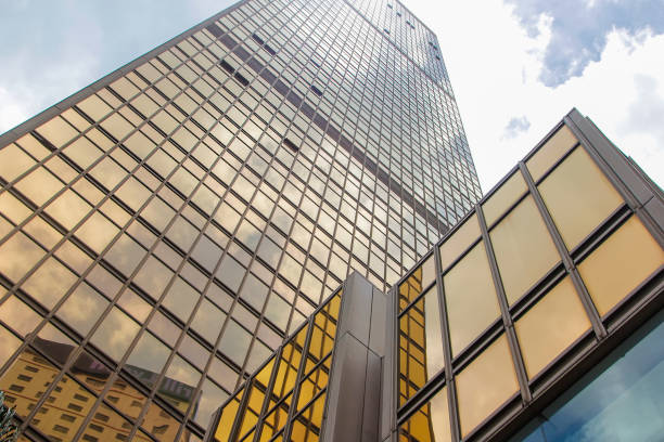 istock Window glass, Modern architecture in the blue sky white cloud city 1133120214