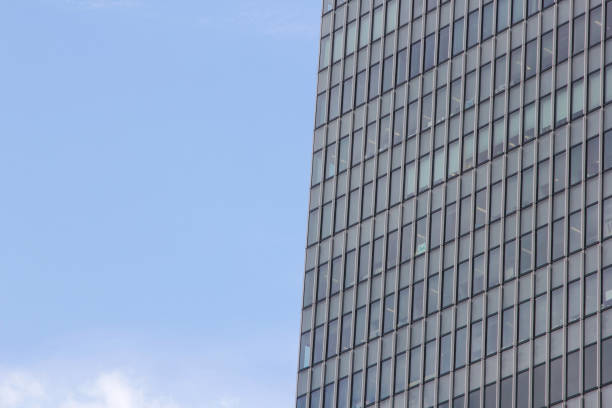 istock Window glass, Modern architecture in the blue sky white cloud city 1133120287