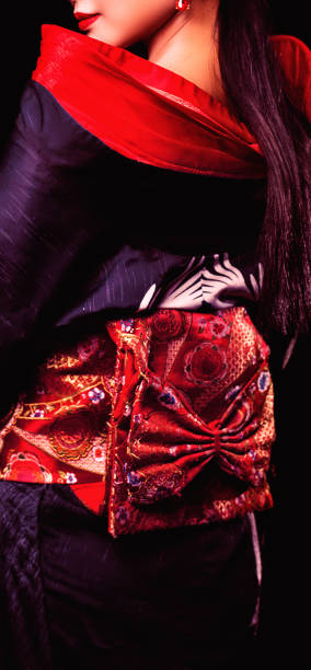 Young Asian girl. She is dressed in Japanese national dress. culture of Japan.