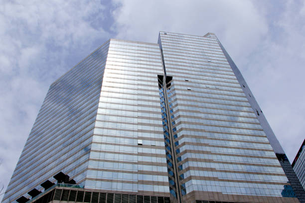 istock Window glass, Modern architecture in the blue sky white cloud city 1133121253