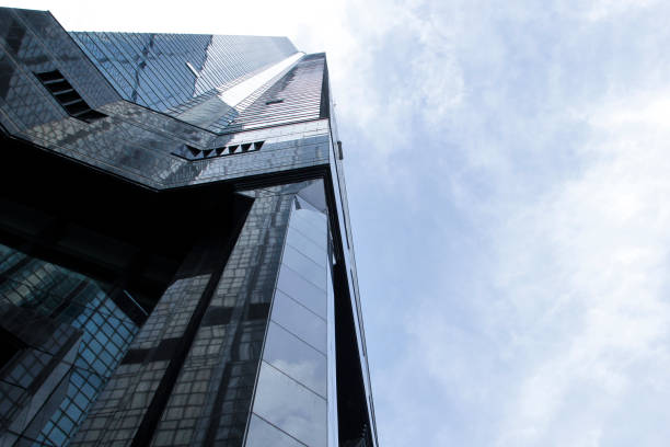 istock Window glass, Modern architecture in the blue sky white cloud city 1133121527