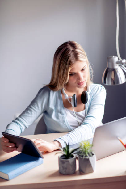 istock Young woman working from home 1133121611