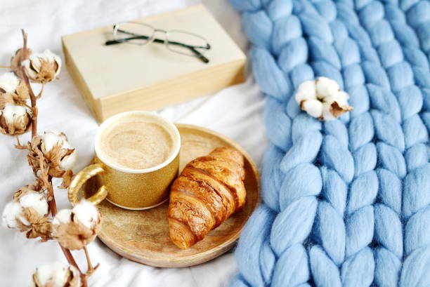 istock Cup with cappuccino, croissant, blue pastel giant plaid 1133123737