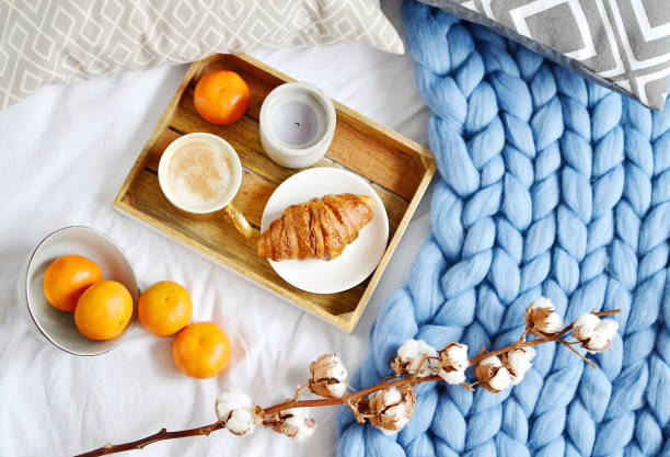 istock Cup with cappuccino, croissant, blue pastel giant plaid 1133125680