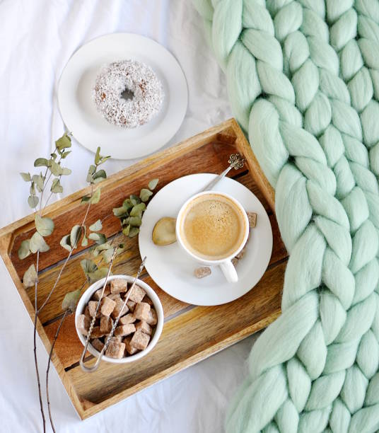 istock Cup with cappuccino, doughnutt, green pastel giant blanket 1133125706