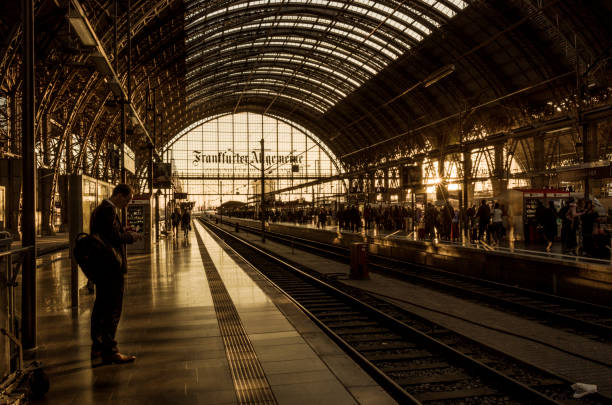 Frankfurt, Germany - September 27 2018: Beautiful architecture of Central Railway station in Frankfurt am Main, Germany. Unidentified commuter waiting at Frankfurt hauptbahnhof.