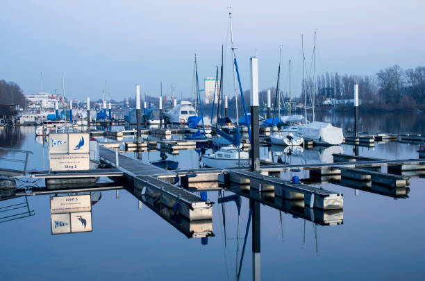 Wiesbaden, Germany - February 17 2019: Yachts parked at sunset in Wiesbaden Schiersteiner hafen, Germany