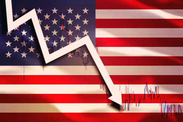 White arrow and chart fall down on the background of the waving flag of USA (United States America) stock photo