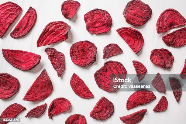 Dried Beet Chips On A White Background Top View Stock Photo - Download Image Now - Beet, Potato Chip, Common Beet