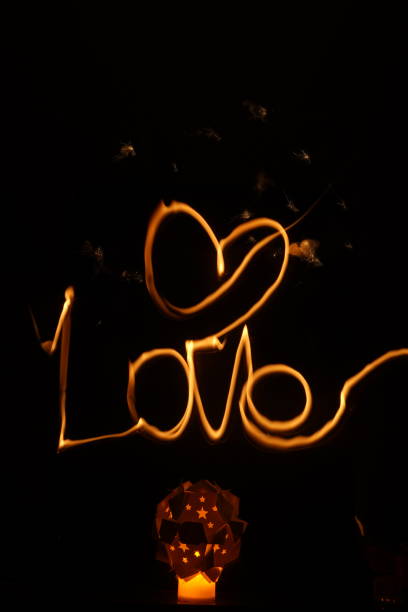 istock A letter written in light LOVE 1133131711