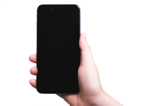 istock Female hand holding smartphone plus blank black screen 1133136822