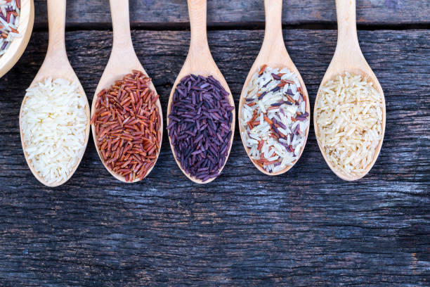 istock Five kinds of rice on wooden spoon. 1133136943