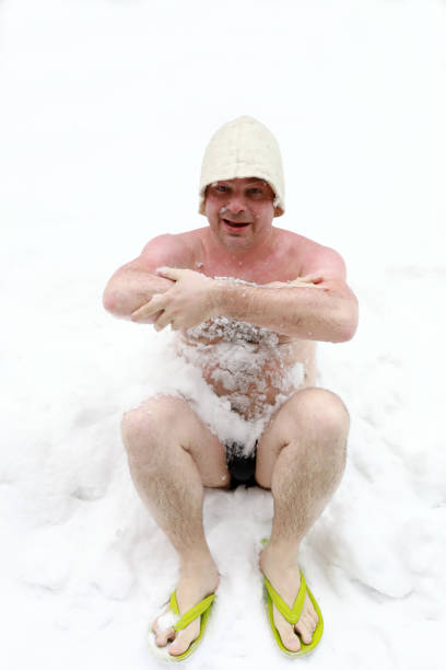 istock Person sitting in snow 1133139822