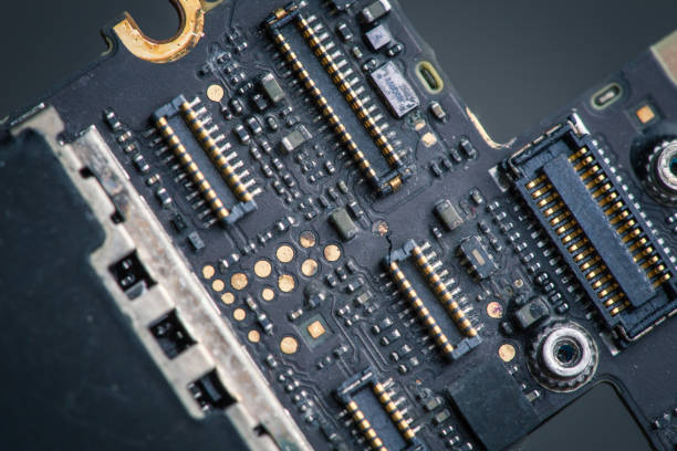 istock Water damaged circuit board of mobile cellphone, pcb, connectors, corrosion. 1133145400