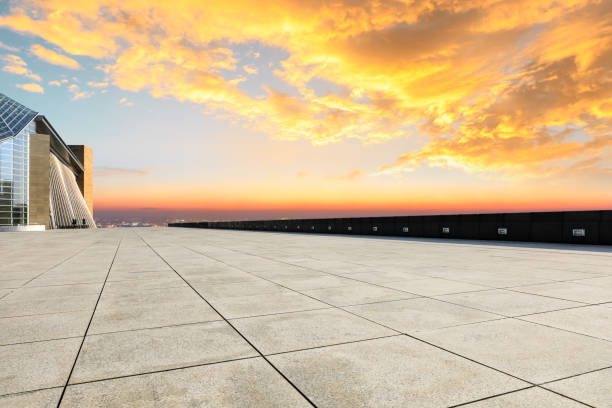 istock Empty floor and modern city skyline with buildings at sunset 1133146387