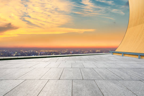 istock Empty floor and modern city skyline with beautiful colorful clouds 1133147925