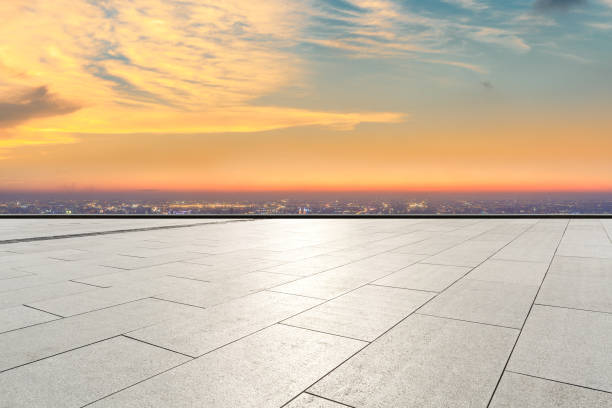 istock Empty floor and modern city skyline with beautiful colorful clouds 1133147943
