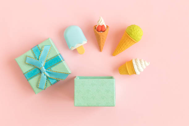 istock Flat lay of gift box and ice cream miniatures abstract. 1133150135