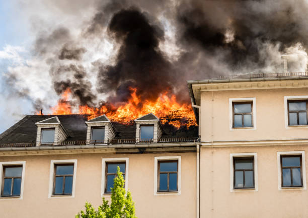 Roof truss in flames Roof truss in flames burning house stock pictures, royalty-free photos & images