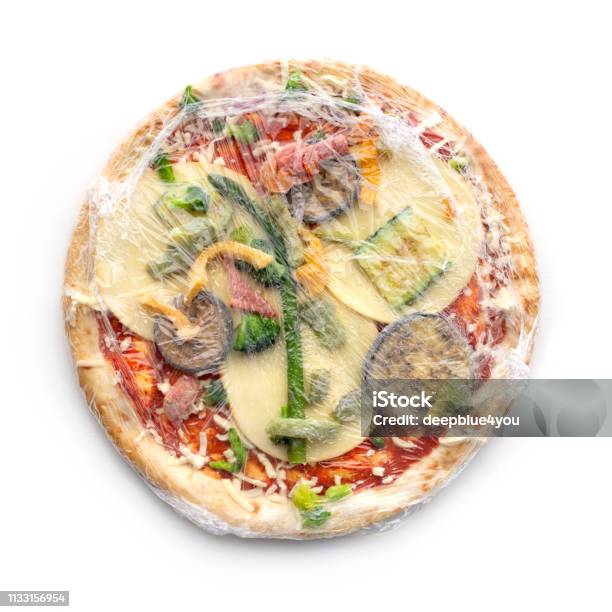 Frozen Pizza In Foil On White Background Stock Photo - Download Image Now - Frozen, Pizza, High Angle View
