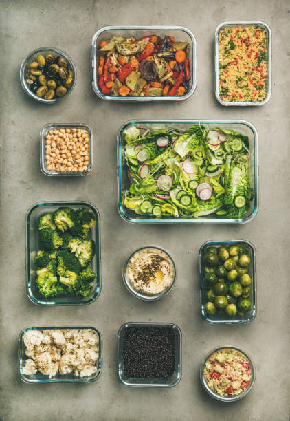 istock Healthy vegan or vegetarian dishes in containers, vertical composition 1133157204