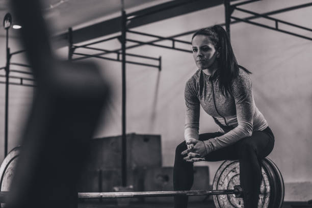 istock Female athlete is resting after workout 1133159183