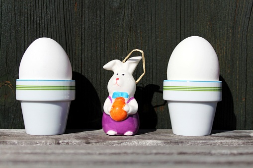 Easter, eggs, egg cups, Easter bunny, wall, wood