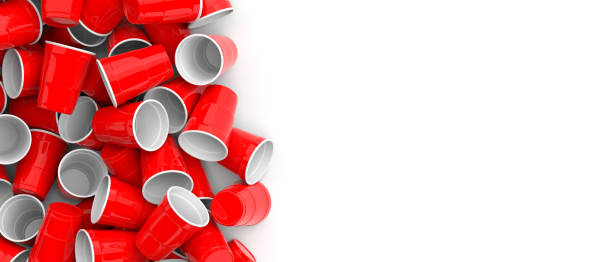 istock Plastic red color disposable cups pile on white background, banner. 3d illustration 1133161787