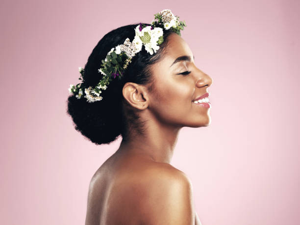She's the queen of beauty Studio shot of a beautiful young woman wearing a floral head wreath boho crown stock pictures, royalty-free photos & images
