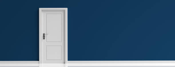 istock Closed door white on dark navy blue wall background, banner. 3d illustration 1133163233