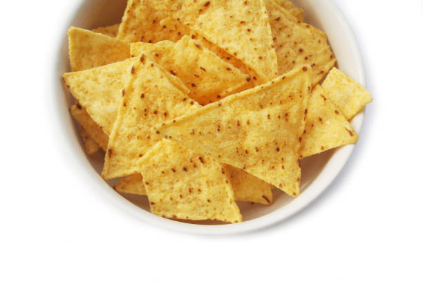 istock Corn Totillas or Nachos chips in a bowl on white 1133163334