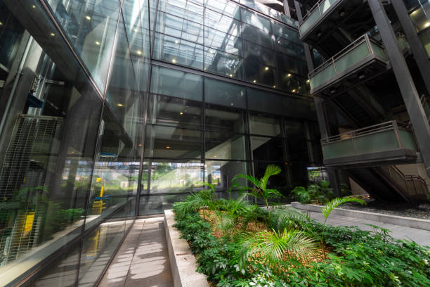 istock Modern glass elevator and pedestrian stairway entrances. 1133164799