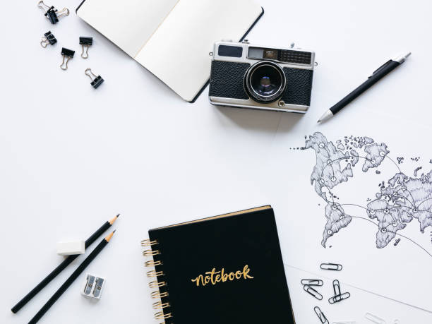 istock Business background with old, vintage camera and hand-drawn world map 1133164815